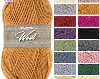 May include: A ball of King Cole Aran wool yarn in a mustard yellow color. The yarn is displayed against a white background with a variety of other colors of yarn in the background.