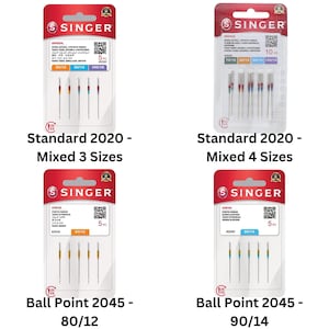 May include: Four blister packs of Singer sewing machine needles. Two packs contain Standard 2020 needles in mixed sizes 80/12, 90/14, and 100/16. Two packs contain Stretch Ball Point 2045 needles in sizes 80/12 and 90/14, featuring color-coded shanks.
