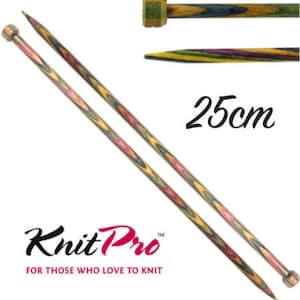 May include: A pair of 10-inch Knit Pro wooden knitting needles with a colourful wood grain pattern. The needles are 25 cm long and have a smooth finish.