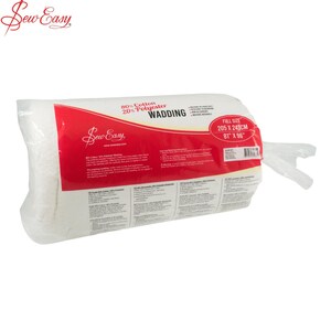 May include: A white cotton and polyester batting roll in a clear plastic bag. The bag has a red label with the text "Sew Easy" and "80% Cotton 20% Polyester Wadding". The label also states the full size is 81" x 96".