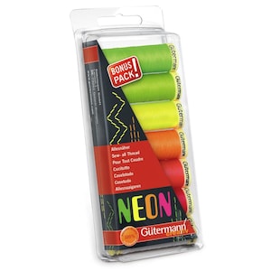 May include: A Gütermann bonus pack of neon sewing thread in a clear plastic blister package. The set includes seven spools in vibrant shades of lime green, yellow, orange, and pink. The packaging features the text NEON and Sew-all Thread.