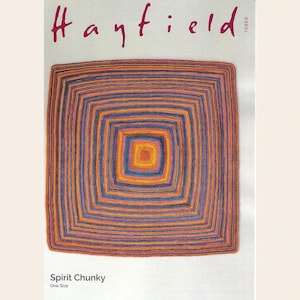 May include: A knitted blanket with a square design, featuring concentric squares in orange, blue, and yellow. The blanket is labelled "Spirit Chunky" and "One Size". The word "Hayfield" is written in cursive at the top.