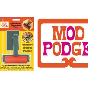 May include: A set of professional decoupage tools from Mod Podge. The set includes a gray and red roller and a gray scraper. The packaging features the Mod Podge logo and instructions for use.
