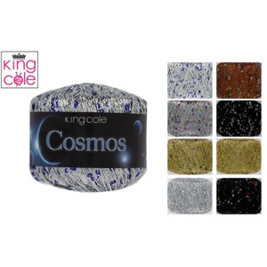 May include: A skein of King Cole Cosmos yarn in silver with blue sequins. The yarn is displayed on a white background with other color variations of the yarn in the background.