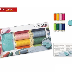 Op de afbeelding: Een waardepakket met Gutermann Creativ naaigaren in acht kleuren, waaronder rood, roze, geel, oranje, groen, blauw en marine. Het pakket bevat ook twee draadknippers.