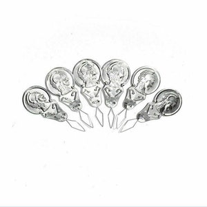 May include: Set of seven silver needle threaders with a decorative design. Each threader has a small loop at the end of the needle.