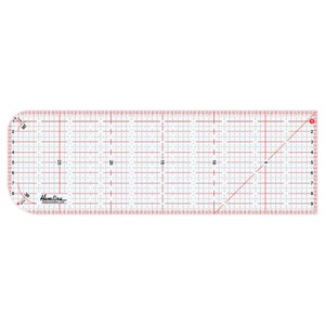 May include: A clear plastic ruler with red markings and a grid pattern. The ruler is 10 inches long and has a curved edge. The ruler is labeled "Hemline".