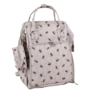 May include: A light grey baby changing bag with a bee print. The bag has a quilted front pocket and a smaller matching pouch. It has top handles and adjustable shoulder straps.