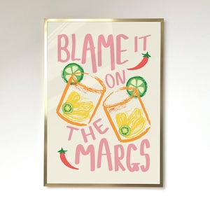 May include: A printable wall art design with a pink and white background featuring two glasses of margaritas with lime wedges and the text "Blame it on the Margs".