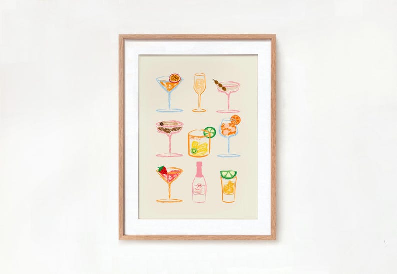 May include: A framed print of a colorful illustration of nine different cocktails, including a margarita, a mimosa, and a gin and tonic.