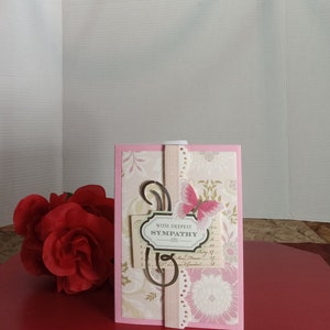 Avec la carte de mes plus sincères condoléances