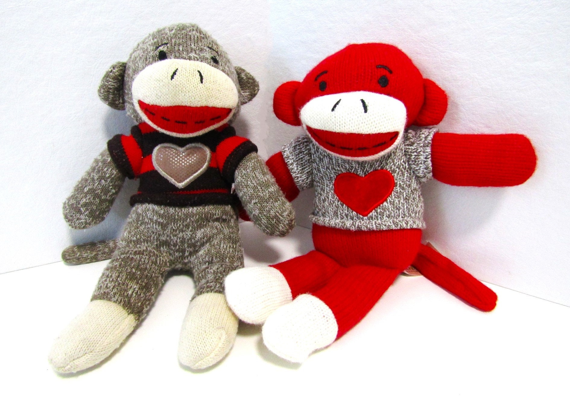 Vintage Sock Monkey Plush Dolls Set of Two, Ten Inch Sock Monkey Brand Dolls, Knit Sock Monkeys with Heart Sweaters Vintage Sock Monkey Plush Dolls Set of Two, Ten Inch Sock Monkey Brand Dolls, Knit Sock Monkeys with Heart Sweaters