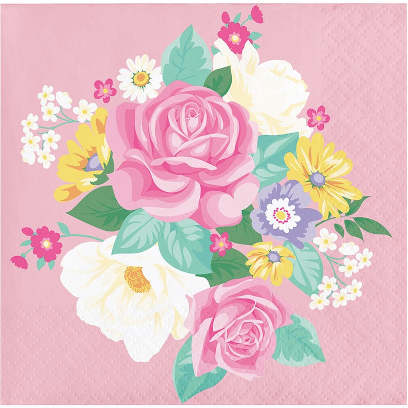 May include: A pink floral design with a bouquet of pink, white, and yellow flowers on a pink background. The flowers are surrounded by green leaves.