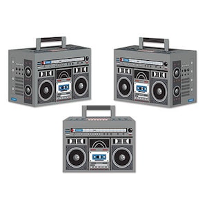 May include: Three gray boomboxes with black and silver details are displayed against a white background. Each boombox has a handle, speakers, and a cassette tape deck. The design is reminiscent of 1980s portable stereo systems.