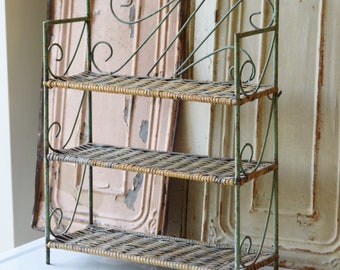 A very pretty wicker with metal frame shelf display