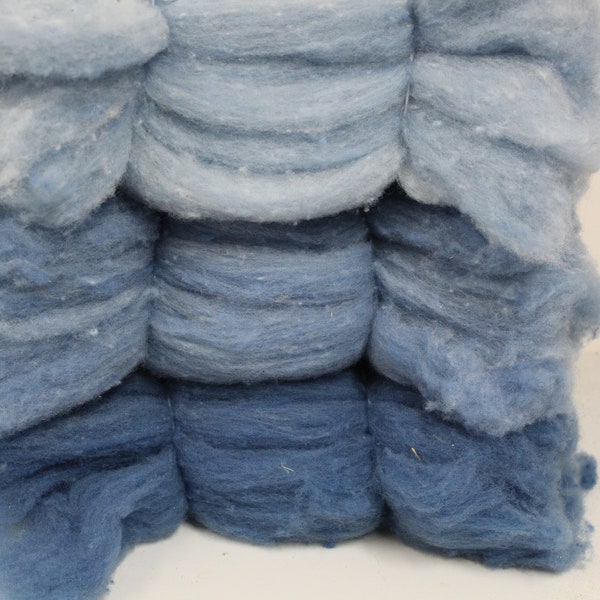 The Indigo blues in 3 shades light blue, med. blue and Dk. med. Blue, 4 one-ounce carded wool batts in a bundle