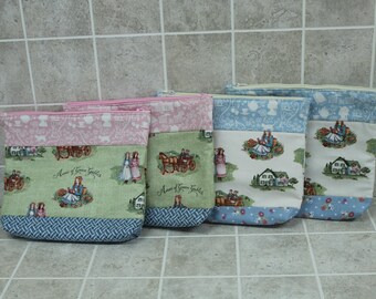 Anne of Green Gables 9 inch zipper pouches cotton designer fabric with prints of her on back ground of green and white.