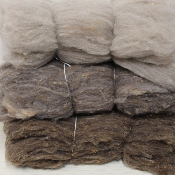 Corriedale Natural Wool in colors of taupe, grays, and white, carded wool that is in batts for felting and other fiber arts.