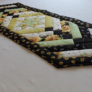 Sunflower table runners, a quilted spring runner that will brighten up room, with yellows, purples and greens, or yellow, green and black