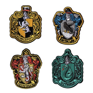 May include: Four embroidered patches featuring the Hogwarts house crests: Gryffindor, Hufflepuff, Ravenclaw, and Slytherin. Each patch features a different animal, colour scheme, and house name.