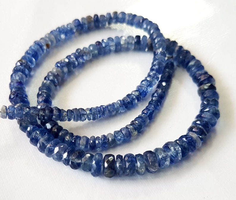 3308 Natural Kyanite faceted rondelle shape Beads Gemstone 3 mm to 7 mm Approx size rondelles 16 inch strand approx  M No.