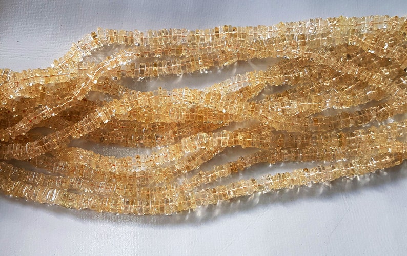 4583 Natural Citrine Smooth Heishi shape beads Gemstone 3 mm to 4 mm Approx size Heishi 16 inch strand approx M No.