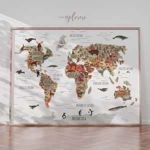 May include: A colorful world map with illustrations of animals and landmarks from different continents. The map includes the names of the continents and oceans. The map is framed in a light wood frame.