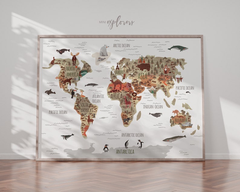 May include: A colorful world map with illustrations of animals and landmarks from different continents. The map includes the names of the continents and oceans. The map is framed in a light wood frame.