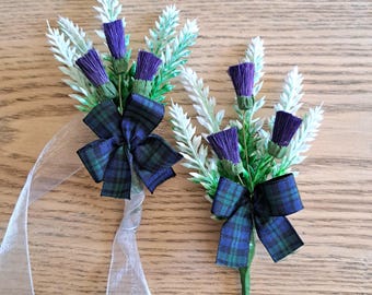 Faux white heather and purple thistle buttonhole or wrist corsage with Black Watch tartan
