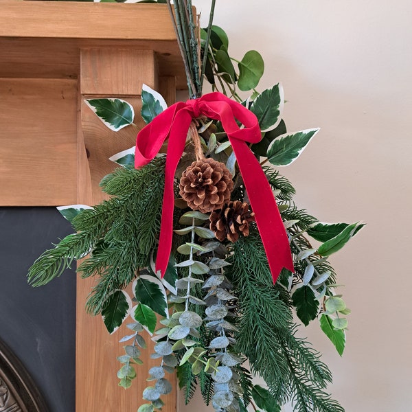 Faux foliage and pinecone swag bundle with velvet ribbon