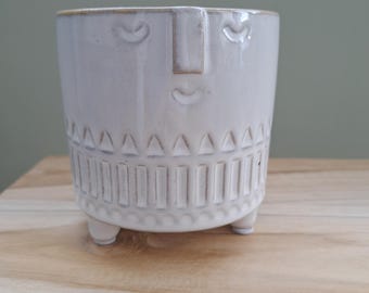 ceramic plant pot with quirky face