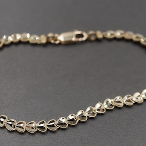 10K Solid Yellow Gold 4.2MM Diamond Cut Sideways Heart Bracelet. 7 Inch
