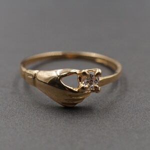 10K Solid Yellow Gold Dainty Hand Holding Stone CZ Band Ring.