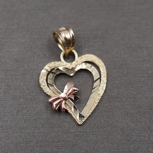 10K Solid Yellow Gold 0.75&quot; Diamond Cut Two Tone Heart With Small Pink Bow Charm Pendant.