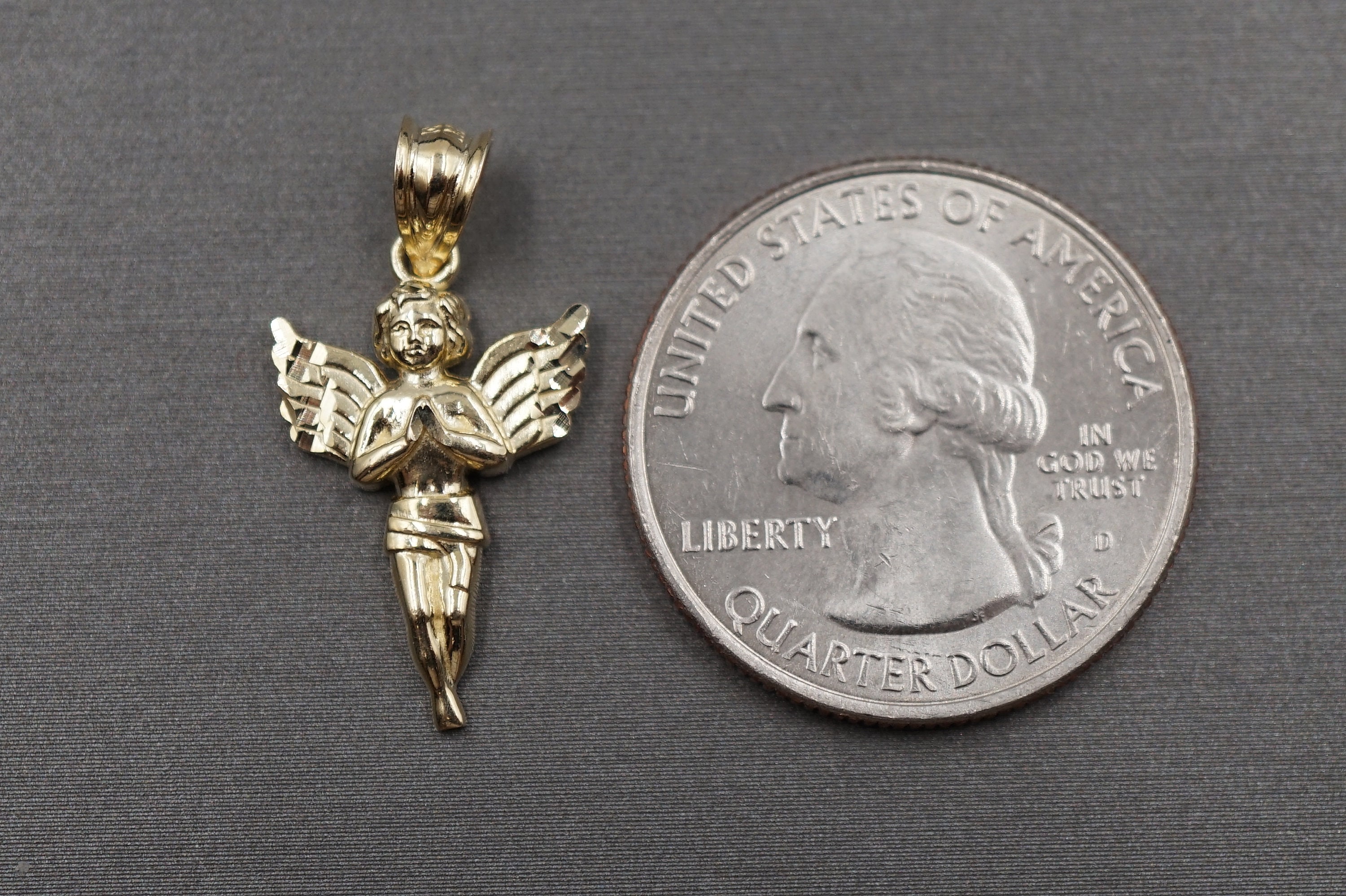 1/2 CT. T.W. Diamond Angel Charm In 10K Gold