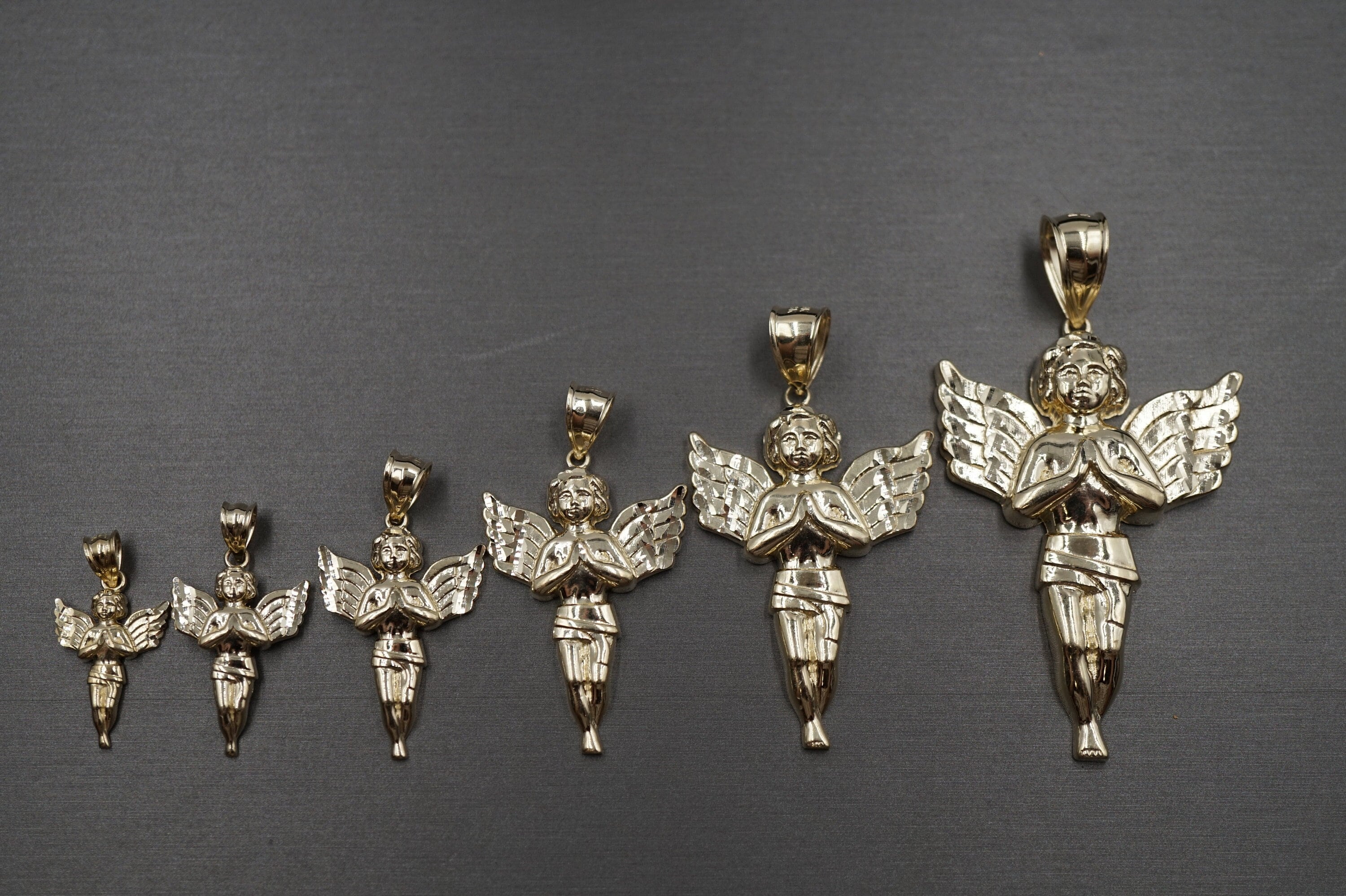 1/2 CT. T.W. Diamond Angel Charm In 10K Gold