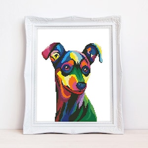 May include: A colorful pixelated cross-stitch pattern of a dog with blue, green, yellow, orange, red, and purple colors. The dog is looking to the right of the image.
