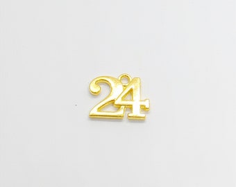 Year 2024 small charms in sets of ten in gold, golden year charms, set of ten gold year charms, gold year embellishment