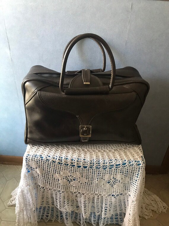 antique american tourister luggage