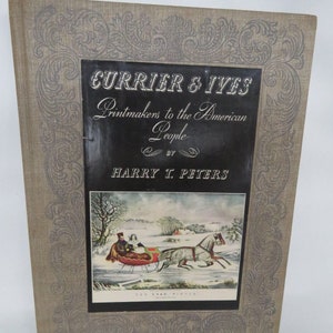 May include: A book titled "Currier & Ives Printmakers to the American People" by Harry T. Peters. The cover features a vintage illustration of a horse-drawn sleigh in a snowy landscape.