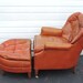 Mid Century Leather Living Room Chair with an Ottoman by Wellington Hall 6975A