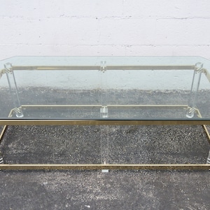 Hollywood Regency Lucite and Brass Finish with Glass Top Coffee Table 2997 SHIPPING NOT INCLUDED Please ask for shipping quote