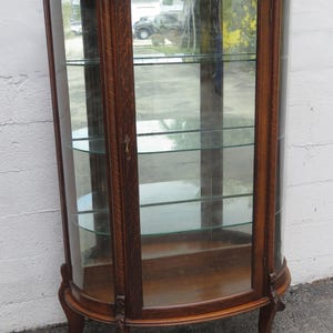 Early 1900s Lion Heads Claw Feet Oak Display Curio Cabinet Cupboard 5676 SHIPPING NOT INCLUDED Please ask for shipping quote