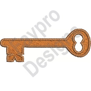 Può includere: Una chiave marrone con un design semplice. La chiave ha una testa arrotondata con un foro per la chiave e un gambo dritto e stretto.