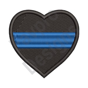 May include: Black heart-shaped patch with a thin blue stripe across the center. The patch is embroidered with a textured fabric.