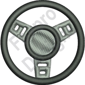 May include: A black and gray steering wheel with three spokes and a textured center. The steering wheel is a common automotive part.