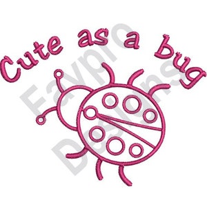May include: Cute as a bug embroidery design featuring a pink ladybug with black spots and the text "Cute as a bug" in pink.