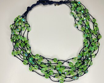 Multi-strand choker necklace with light green half crystal beads on brown waxed cord, handmade gift idea made in Italy