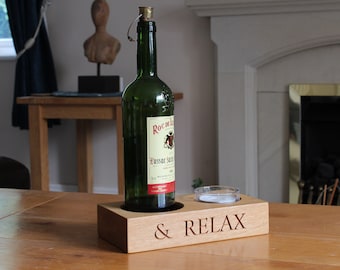 Bottle and Tea-light holder in Oak.