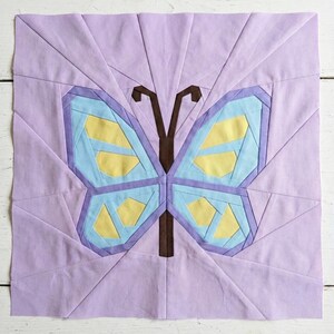 Butterfly quilt block pattern in 4 different sizes, perfect scrap buster, shown with sewing utensils